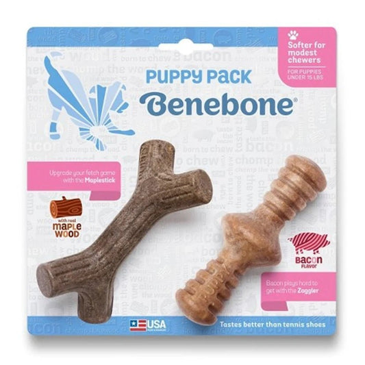 A stick-shaped and roller-shaped dog chew toys in its package