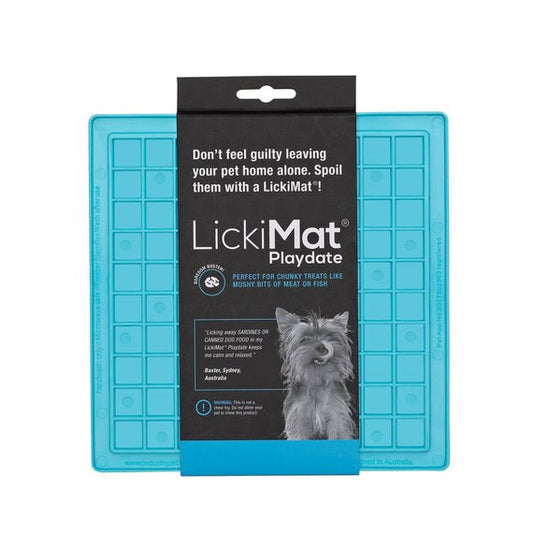 A turquoise square rubber mat with small squares inside and a packing band around the LickiMat.