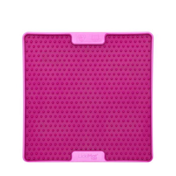 A pink square hard case rubber mat with small numbs inside.