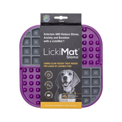 A purple square hard case mat with numbs and squares inside and a packing band around the LickiMat.
