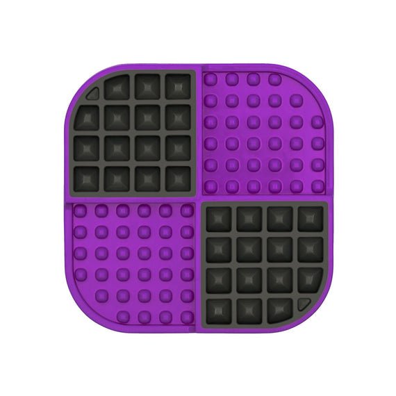 A purple square hard case mat with numbs and squares inside.