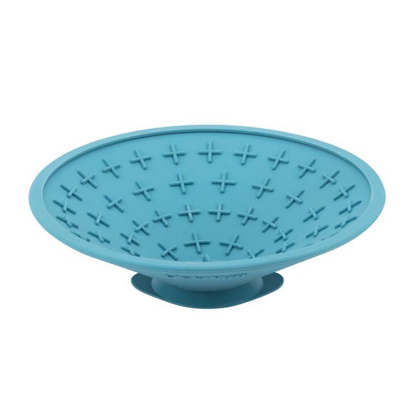A turquoise rubber bowl with plus signs inside.