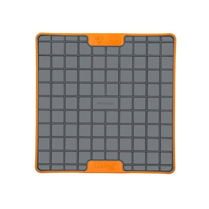 A orange square hard case rubber mat with squares inside.