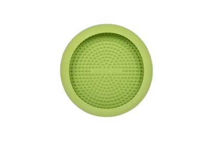 A green rubber bowl with numbs inside.