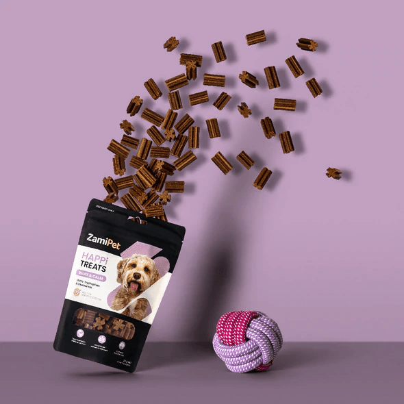 A packet of Relax and Calm Dog Treats with the treats coming out the top of the packet.